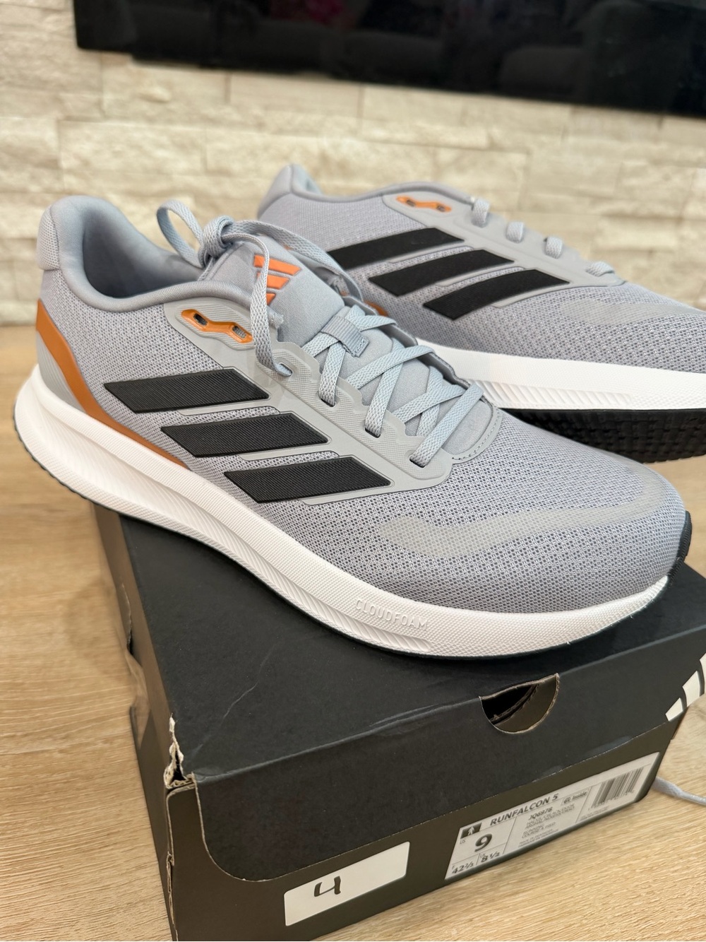 adidas Light Grey Mesh Running Shoes with Black Stripes and Orange Accents